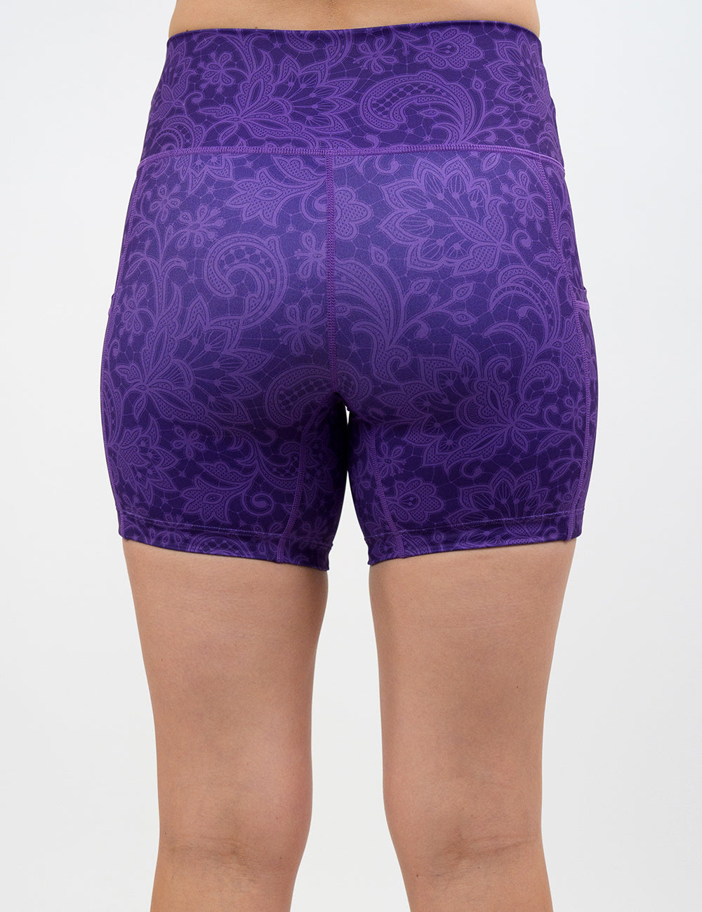 back of the purple paisley shorts against a white background