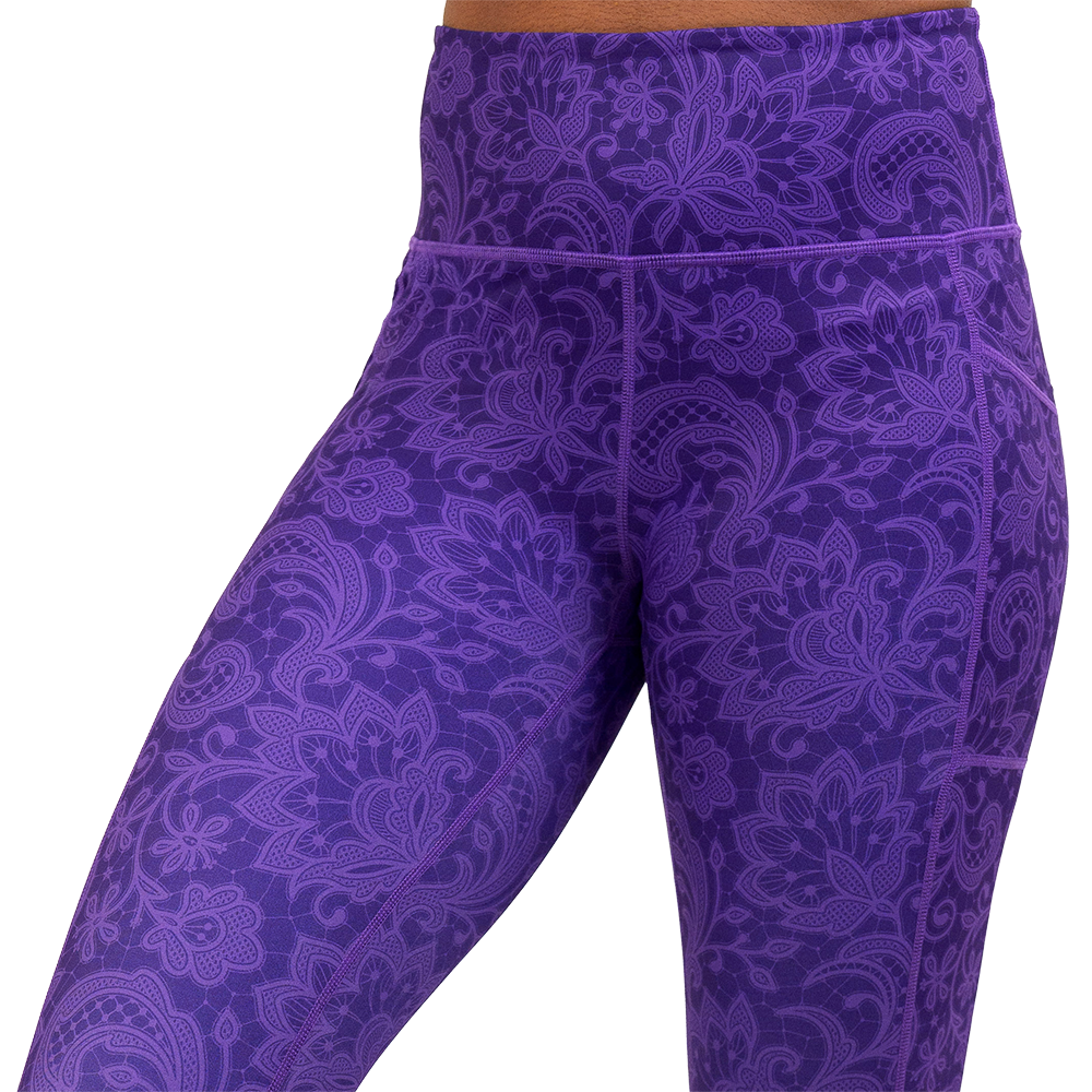 purple flower artwork leggings up close facing the front against a white background