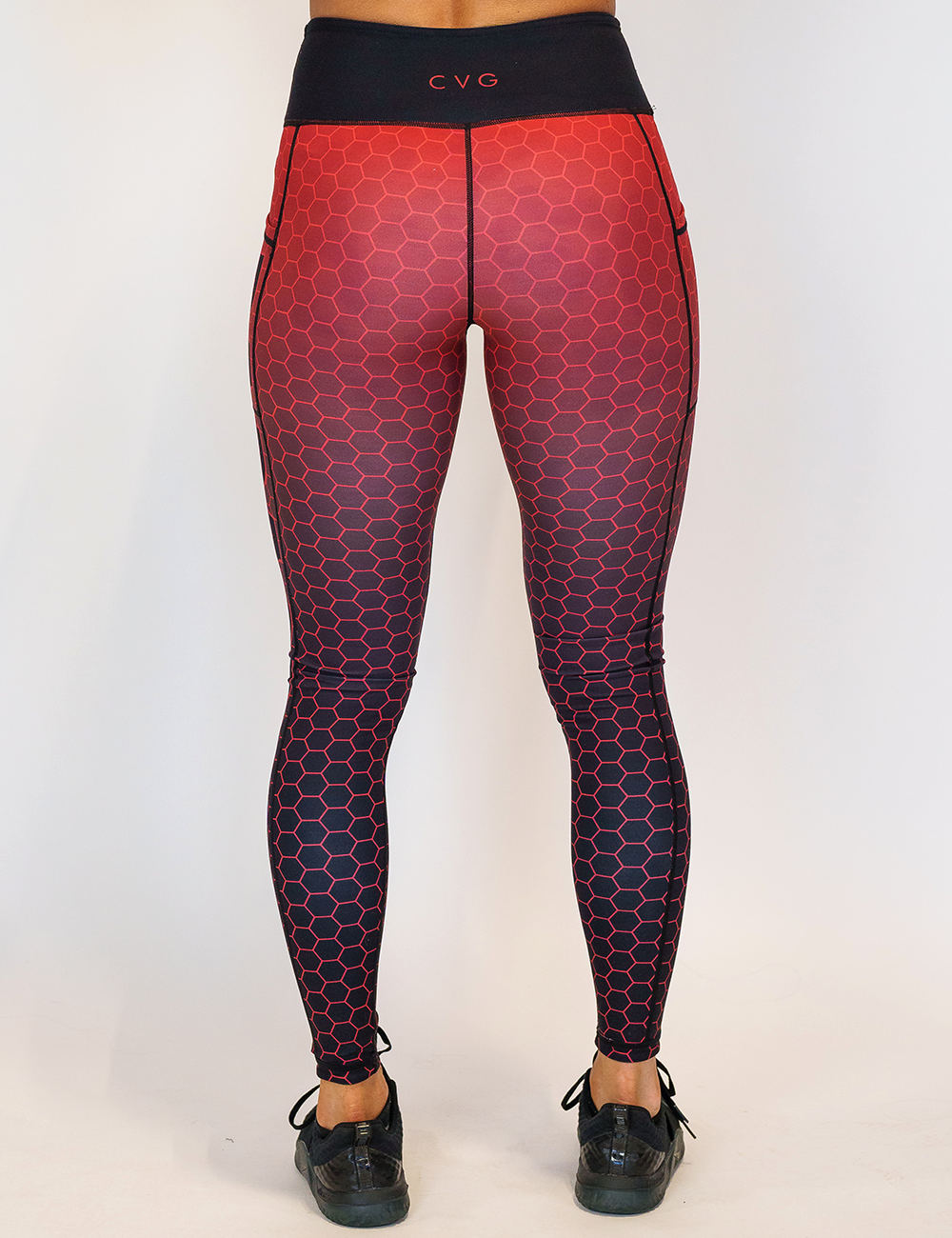 back of the full length red hex badass leggings against a white background