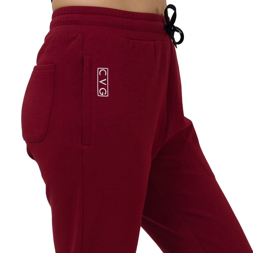 dark red sweatpants with a visible brand logo on a white background