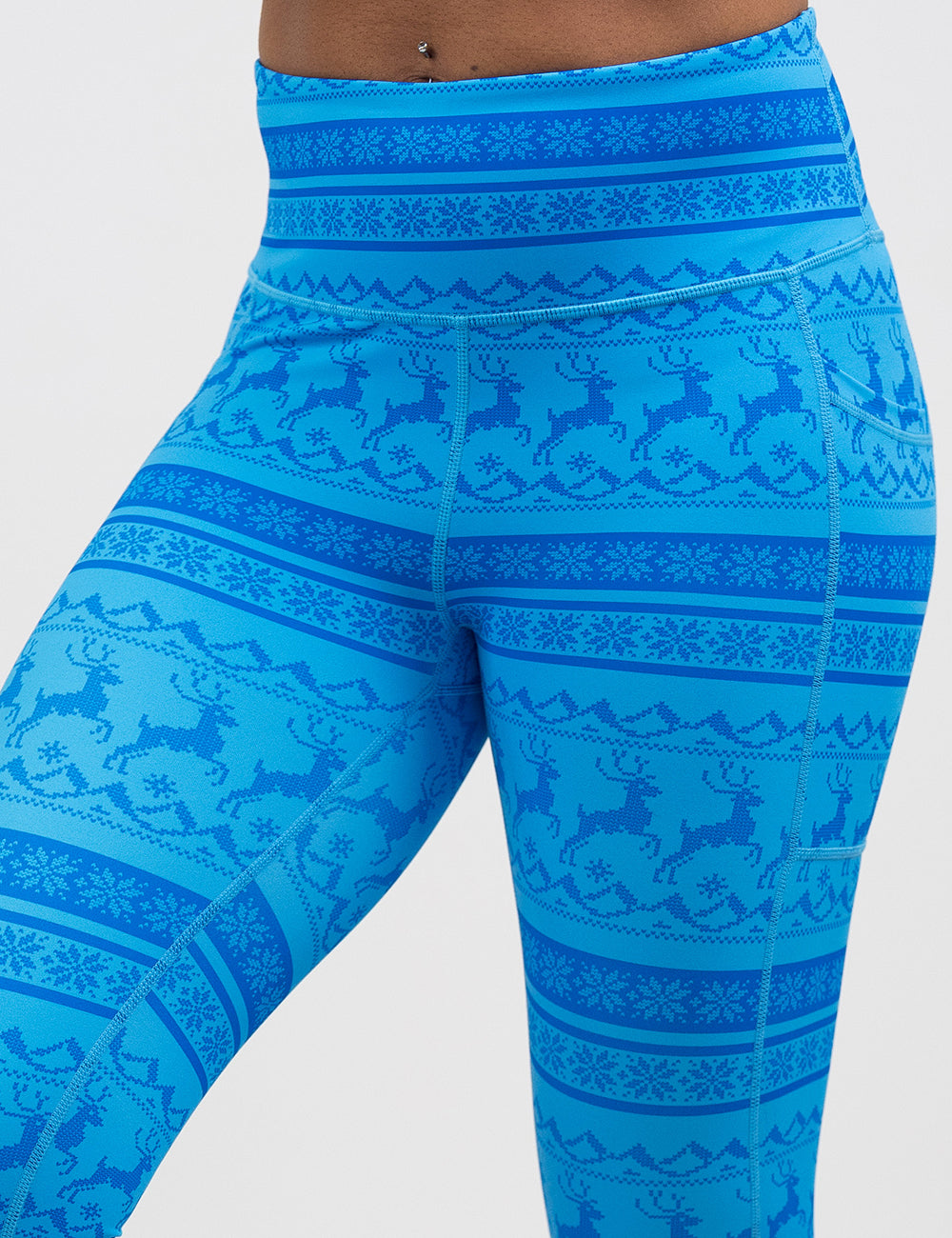 front of the Blue patterned leggings with reindeer design against a white background