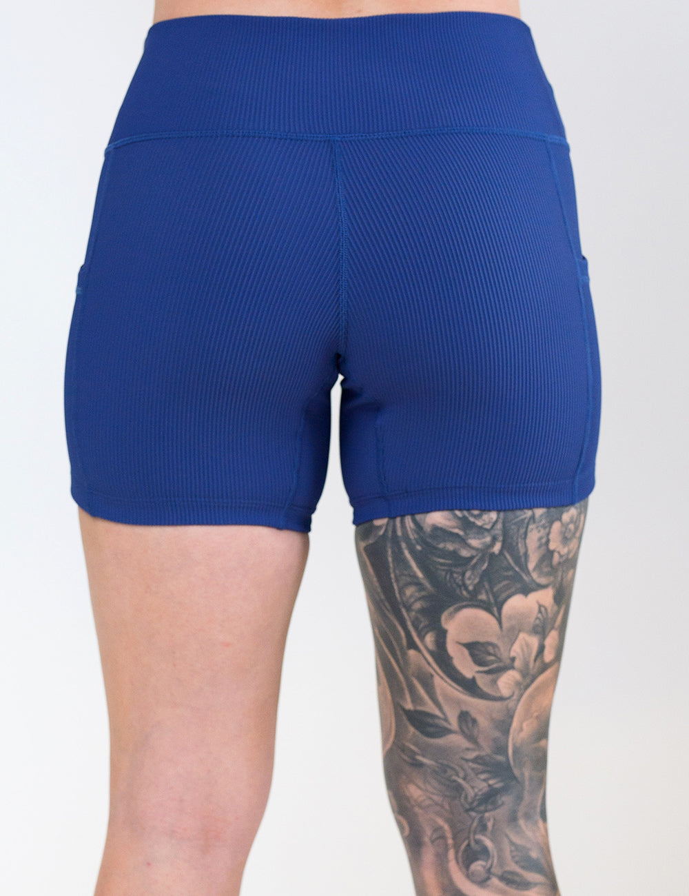 back of the 5 inch navy ribbed shorts against a white background