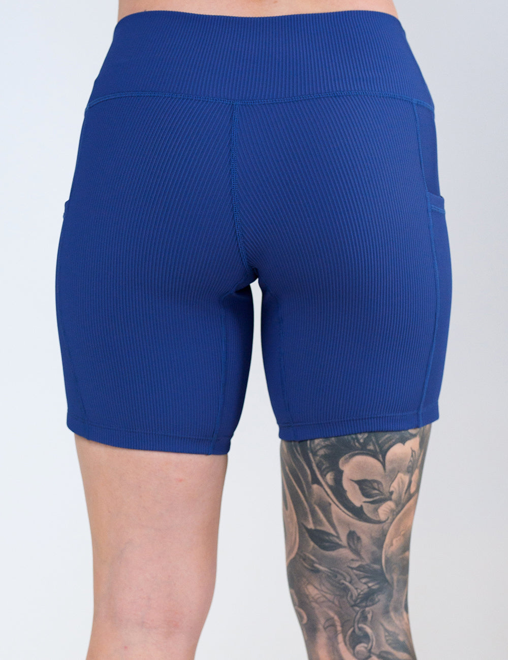 back of the 7 inch navy ribbed shorts against a white background