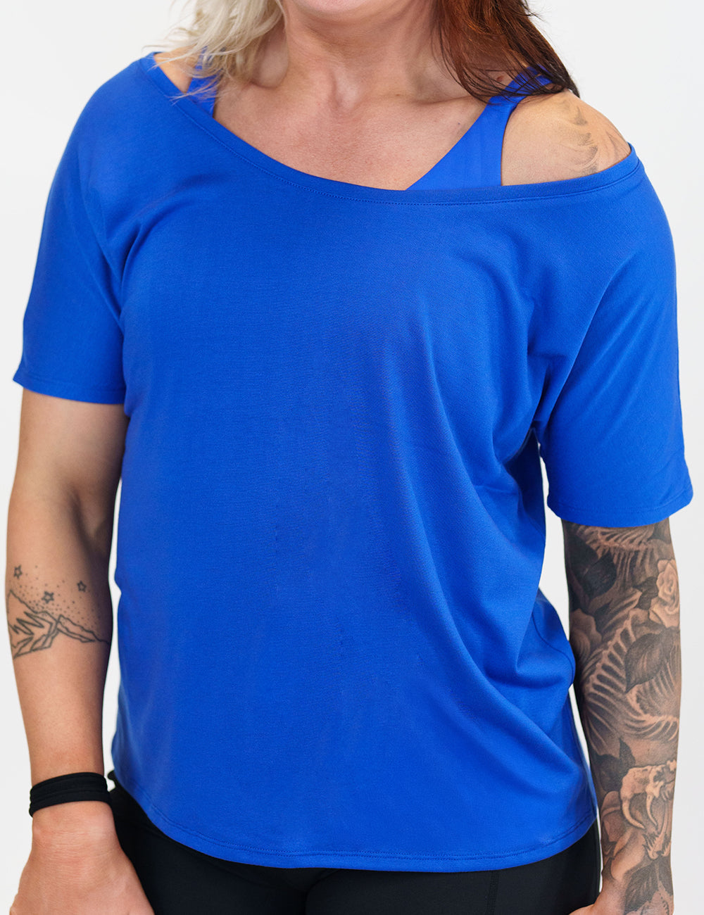 model wearing a royal blue slouchy tee