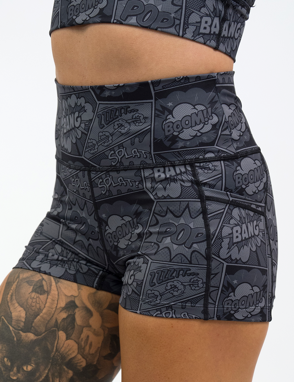 black and grey comic book print 2.5 inch shorts facing the front against a white background