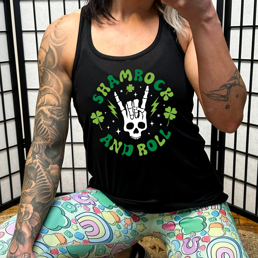 black shirt with the quote "Shamrock and Roll" on it