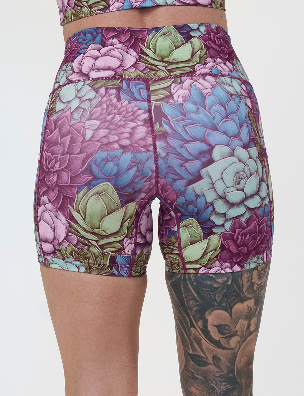 back of the 5 inch succulents and flowers shorts against a white background