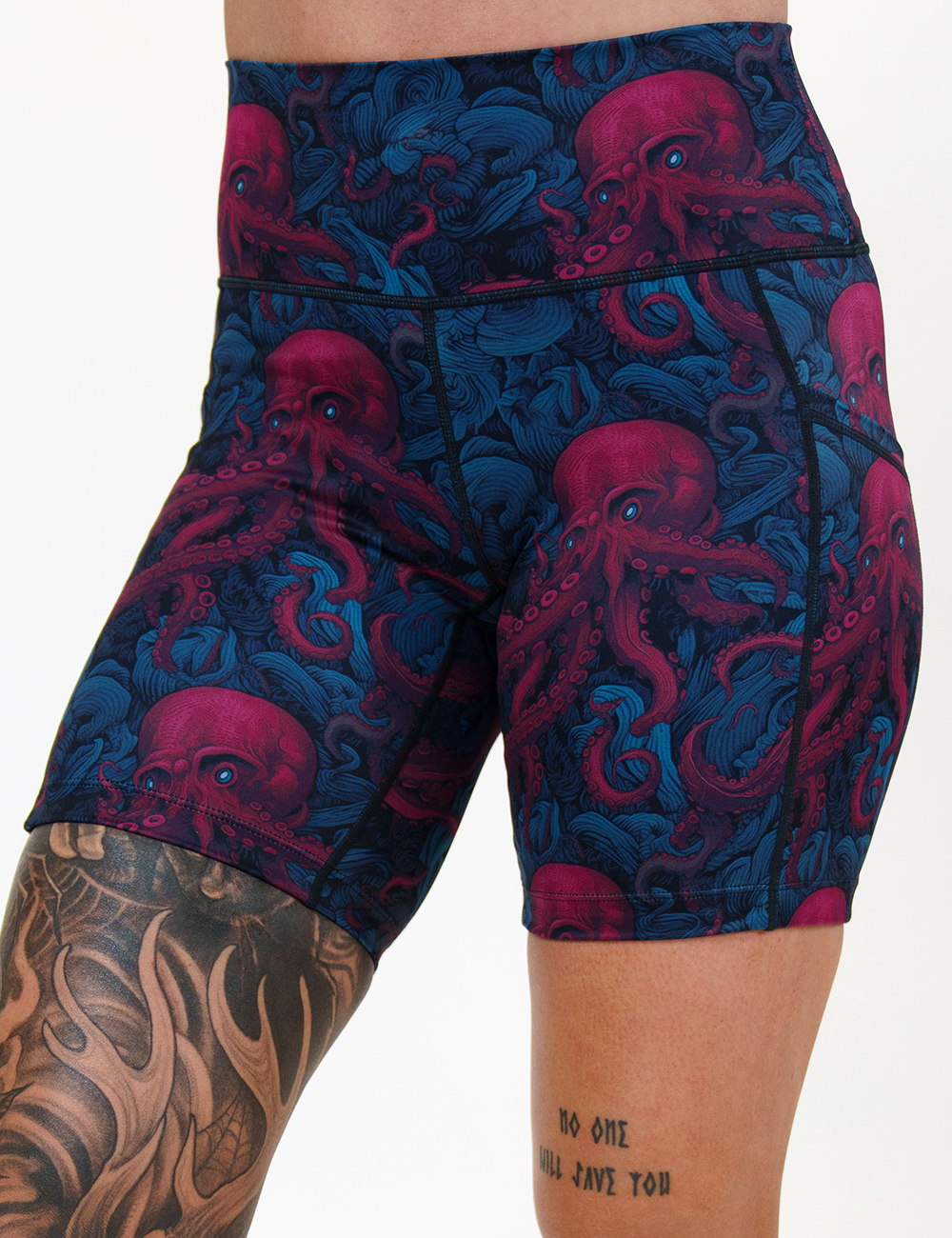 7 inch maroon octopus with blue eyes shorts facing the front against a white background