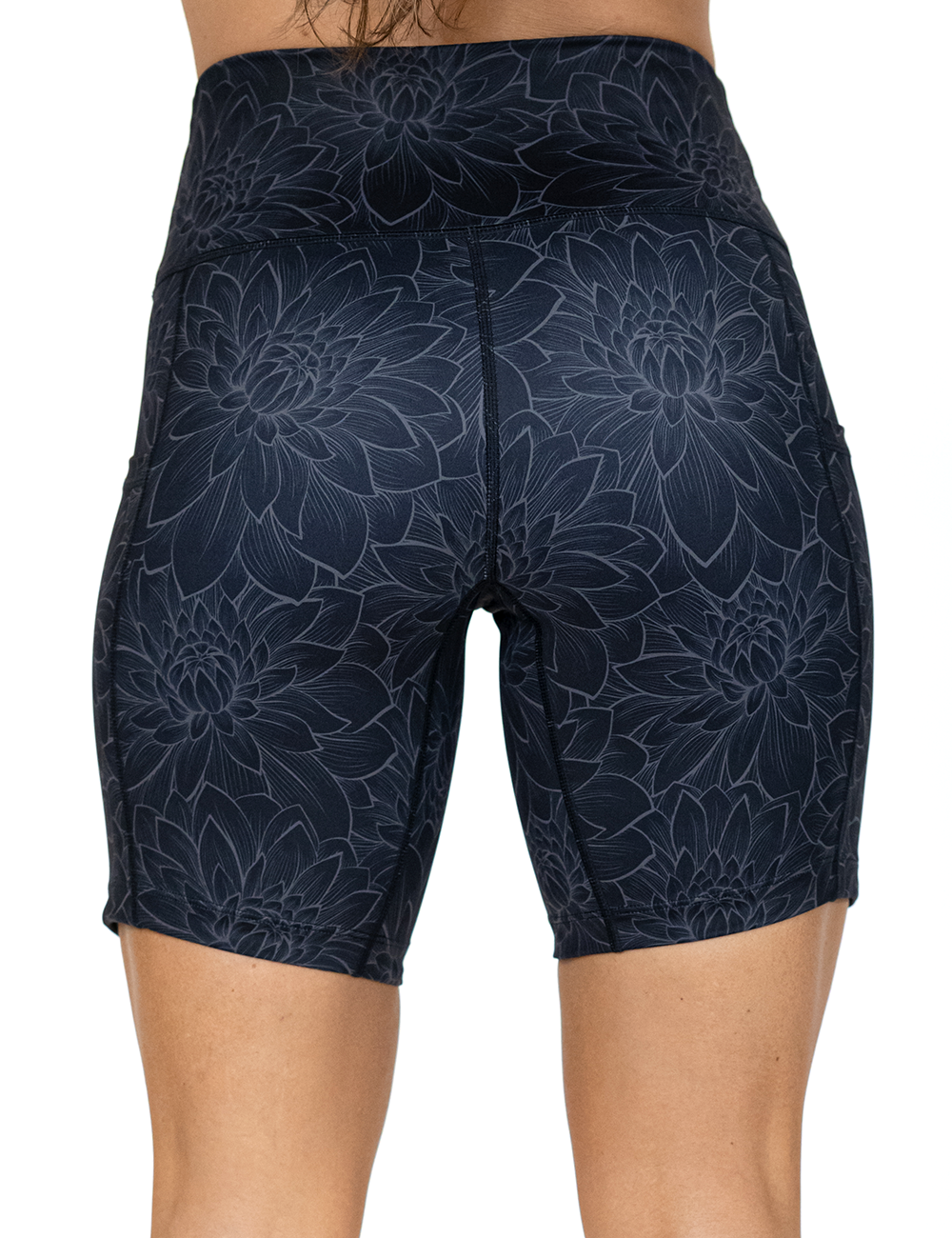back of the 7 inch etched lotus flowers against a black background shorts