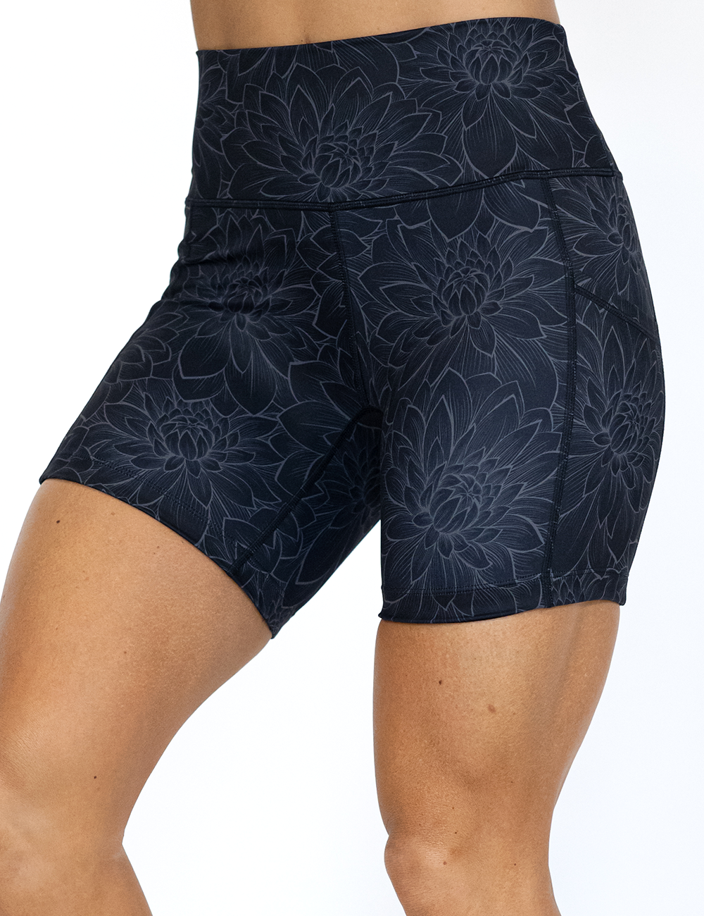 7 inch etched lotus flower against a black background shorts facing the front against a white background