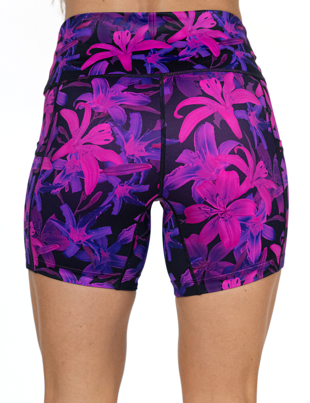 back of the 5 inch purple flowers shorts against a white background