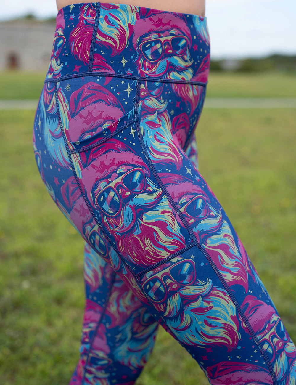 close up of the colorful Santa-in-sunglasses leggings