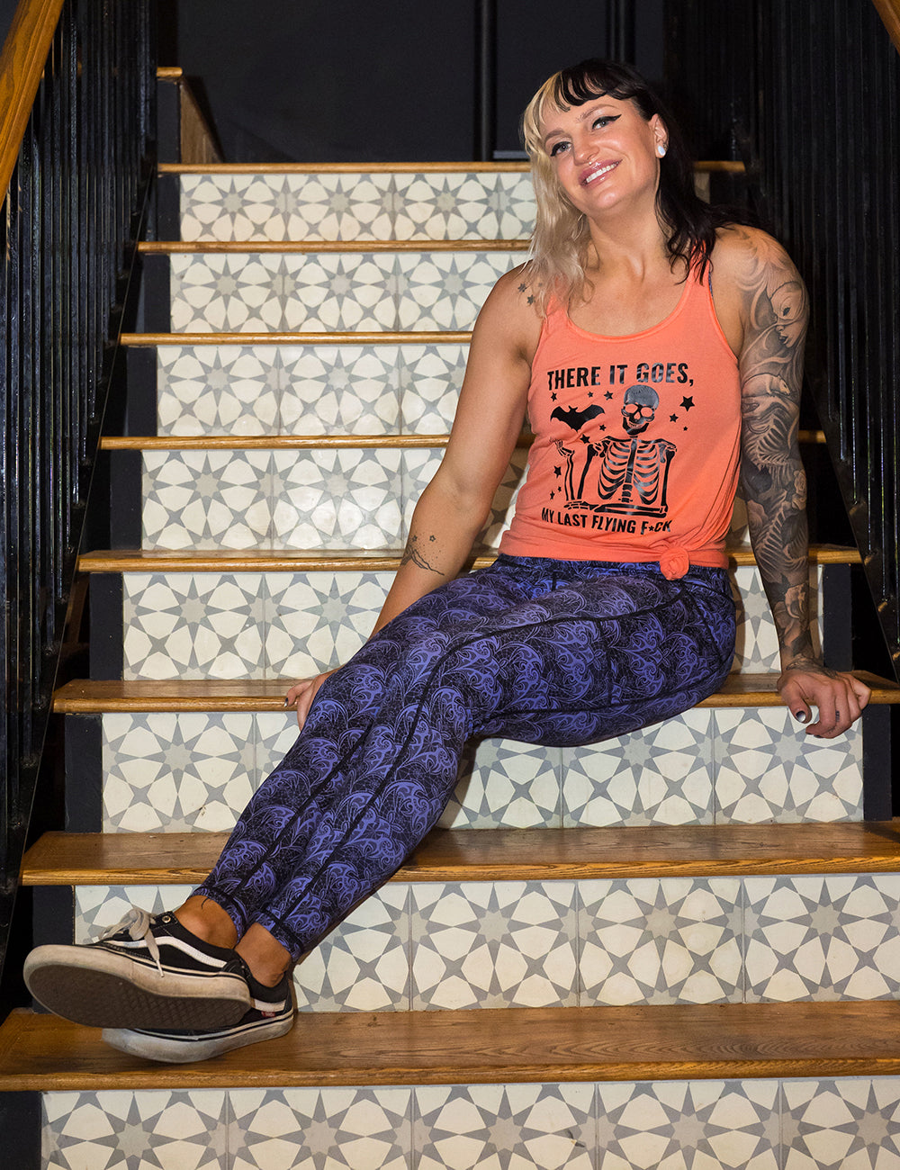 model wearing the purple lace bats full length leggings