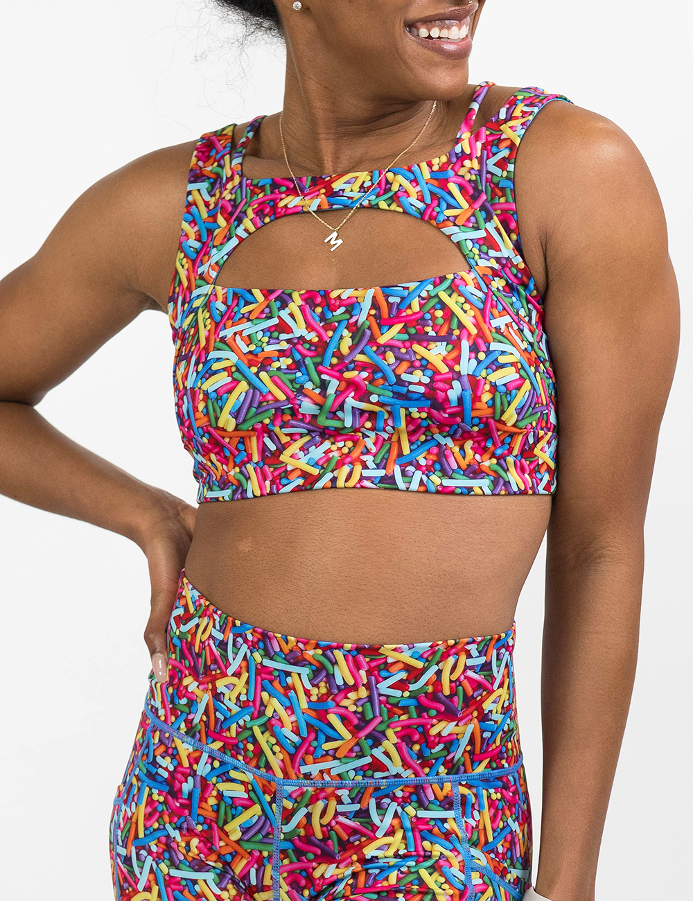 front of the rainbow vista sprinkles bra against a white background