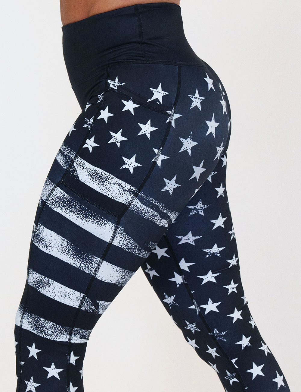 black leggings with white American flag design on it