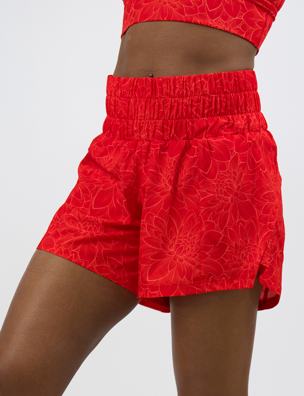 front of the 5.5 inch orange lotus day dream shorts against a white background