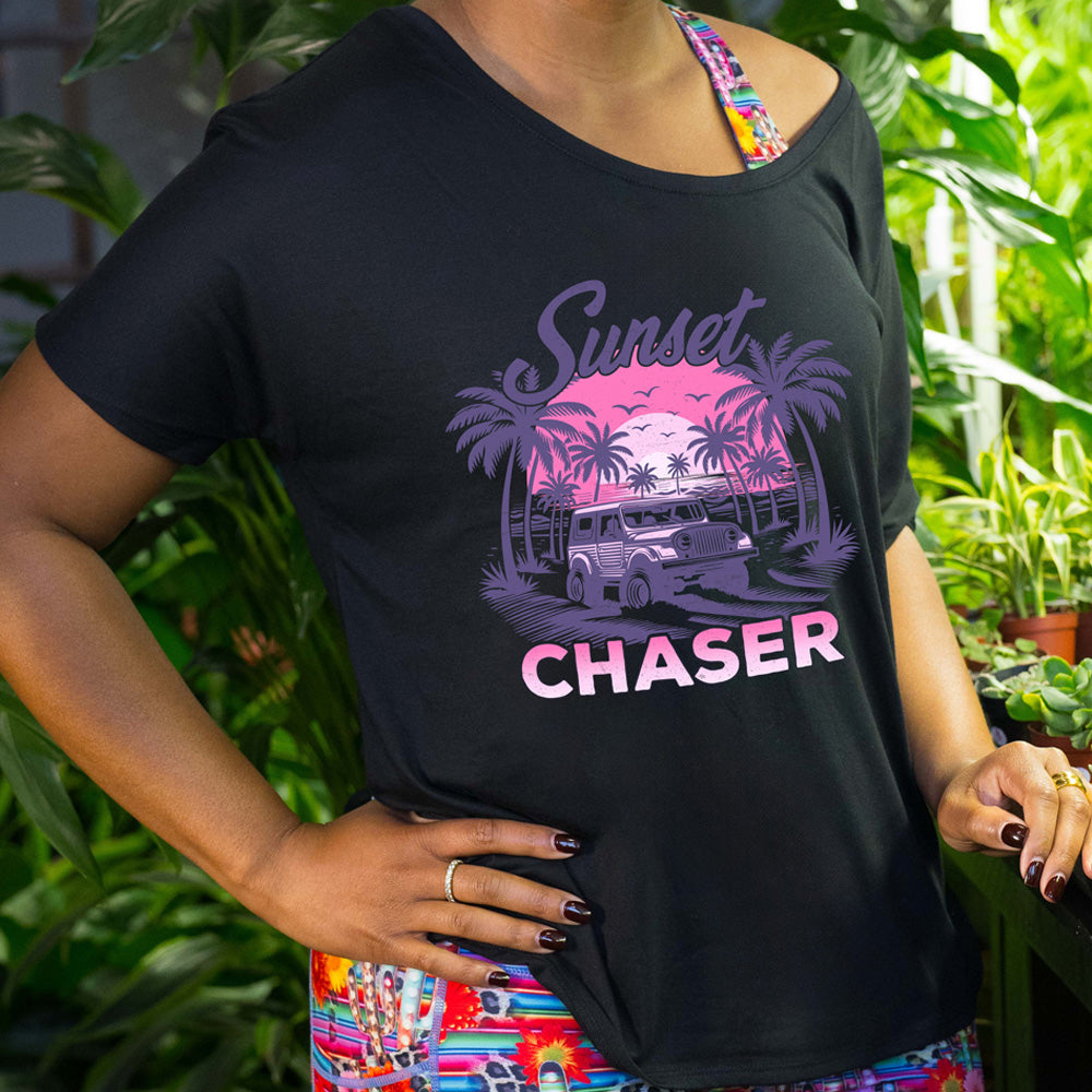 shirt with a vehicle on the beach graphic on it that says "Sunset Chaser"