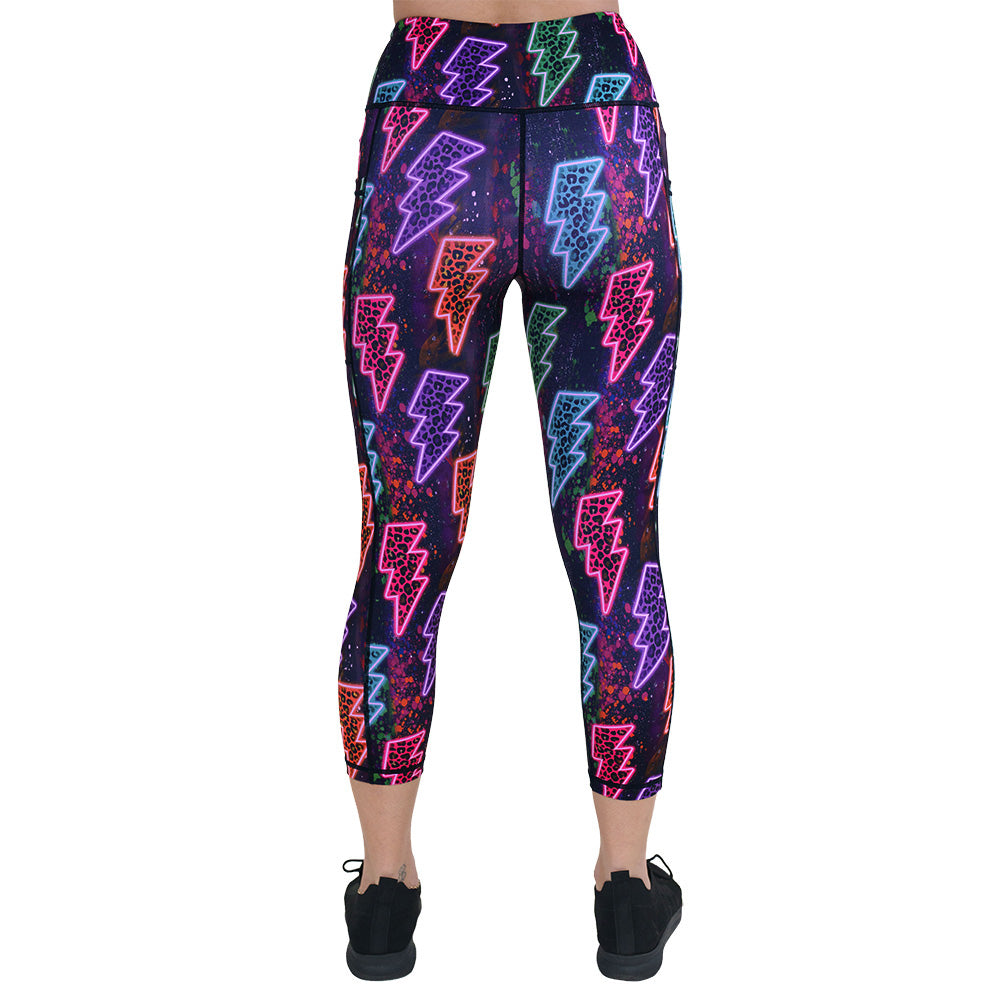back of the neon thunderbolts patterned leggings