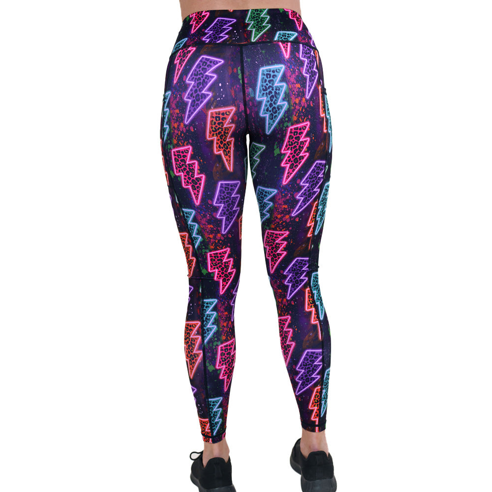 back of the neon thunderbolts patterned leggings