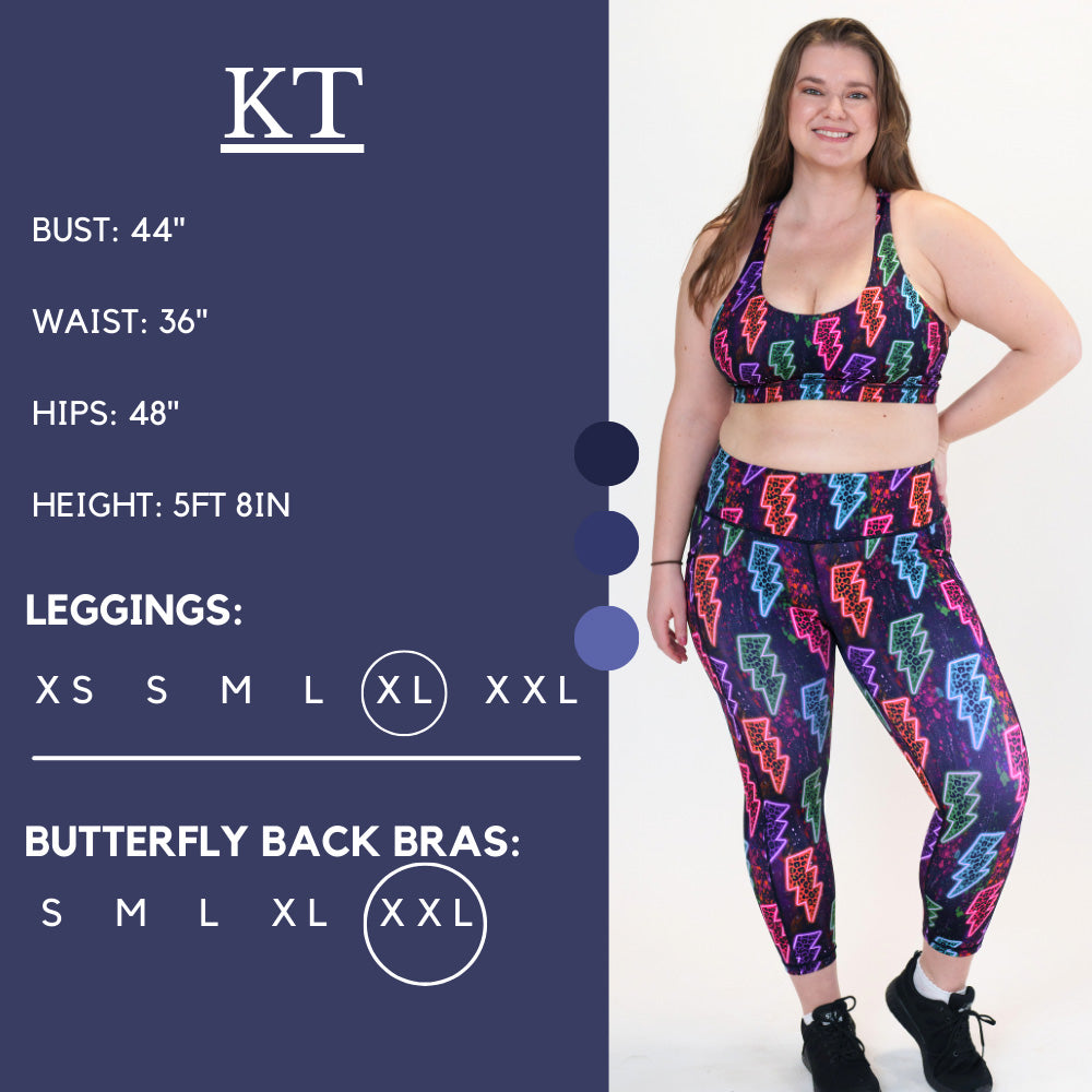 Model’s measurements of 44” bust, 36” waist, 48” hips and height of 5 ft 8 in. She is wearing a size x-large in our leggings and a size x-large in our butterfly back bra