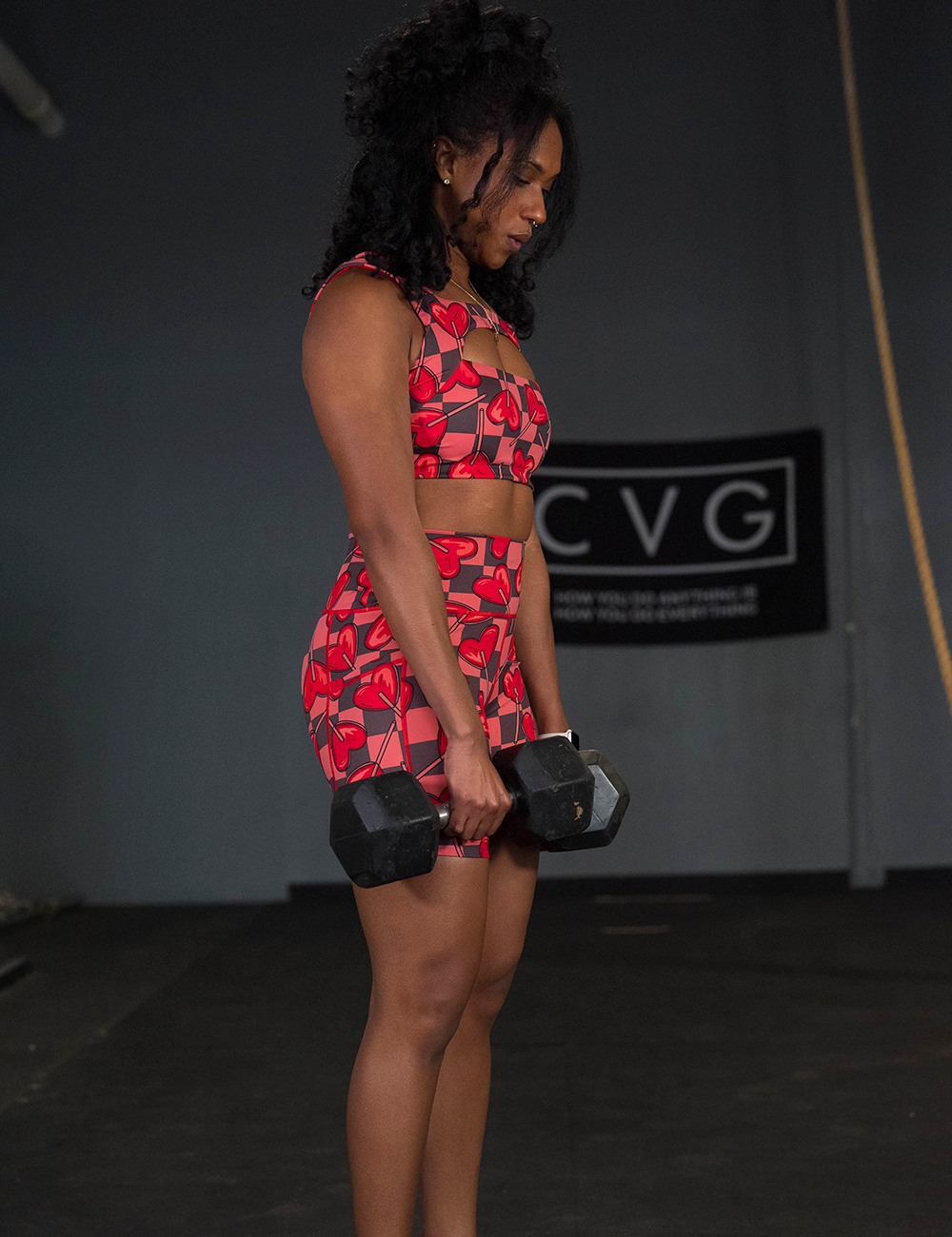 heart lollypops on a checker board background pattern shorts and sports bra in the gym
