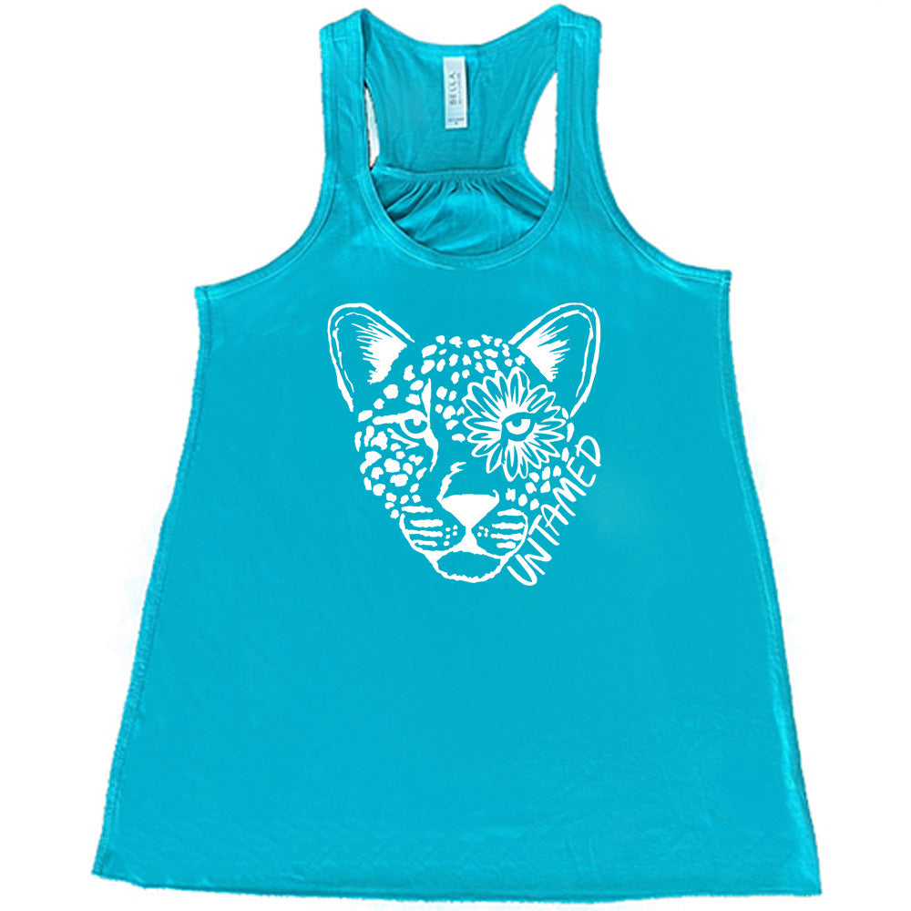 leopard and the words "untamed" on a teal racerback tank