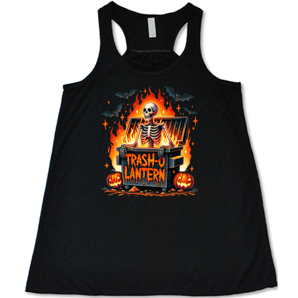 black shirt with a skeleton graphic and the quote "trash-o lantern" on it