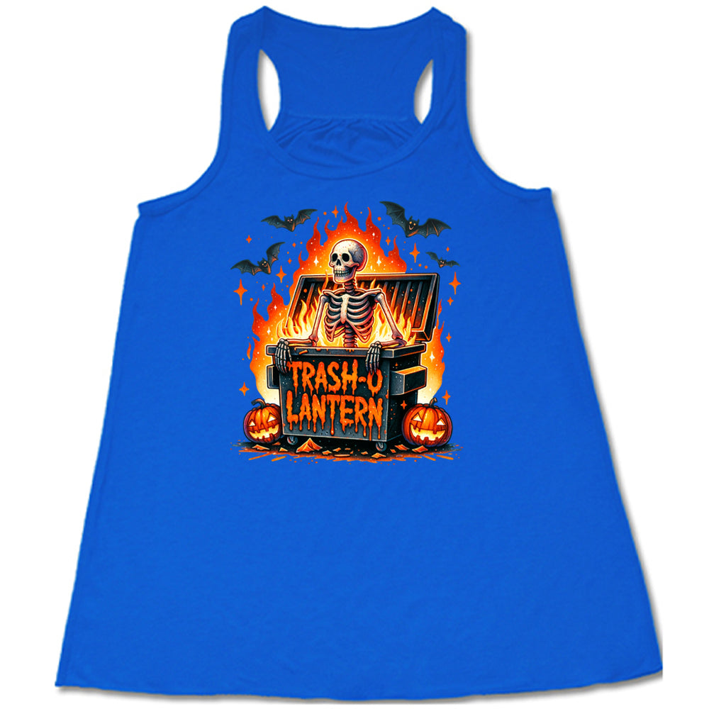 blue shirt with a skeleton graphic and the quote "trash-o lantern" on it
