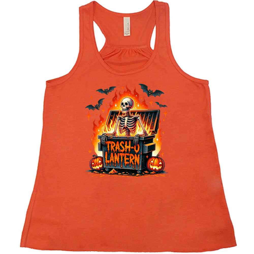 coral shirt with a skeleton graphic and the quote "trash-o lantern" on it