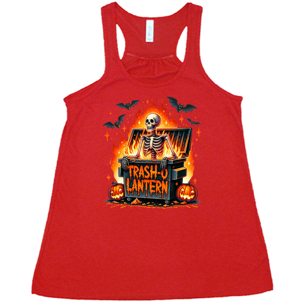 red shirt with a skeleton graphic and the quote "trash-o lantern" on it
