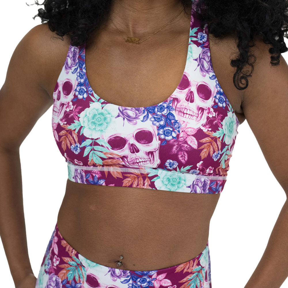 skull and flower patterned sports bra