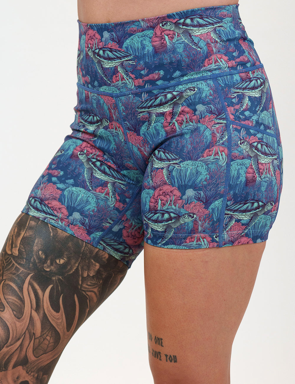 front of the 5 inch turtle patterned shorts against a white background
