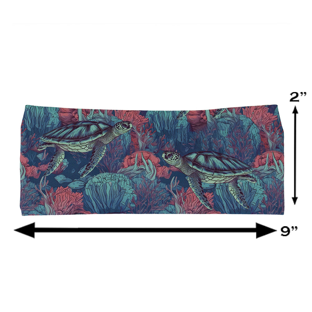 turtle patterned headband measured at 2 by 9 inches