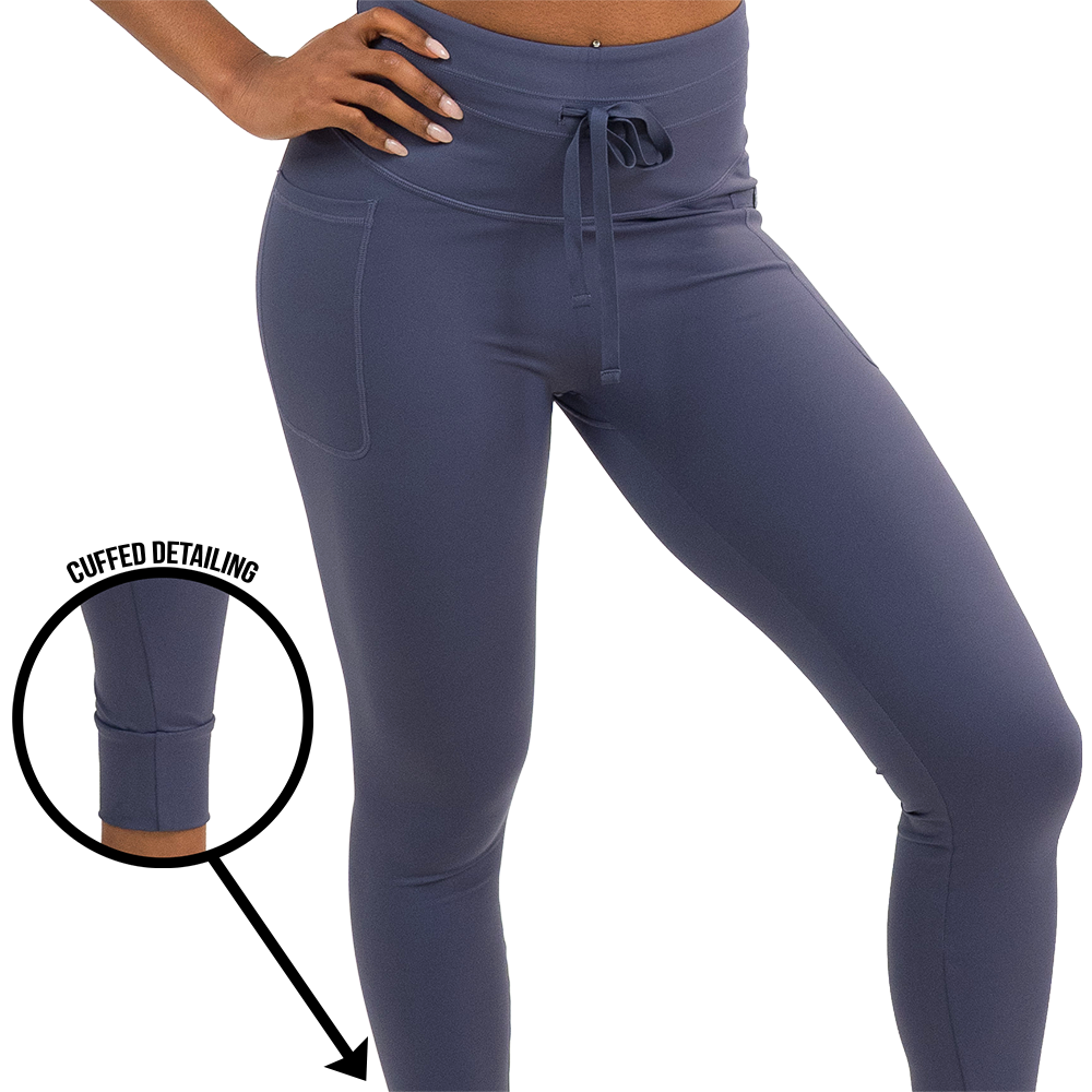omni twilight purple leggings with a magnified snapshot showcasing the cuffed detailing against a white background