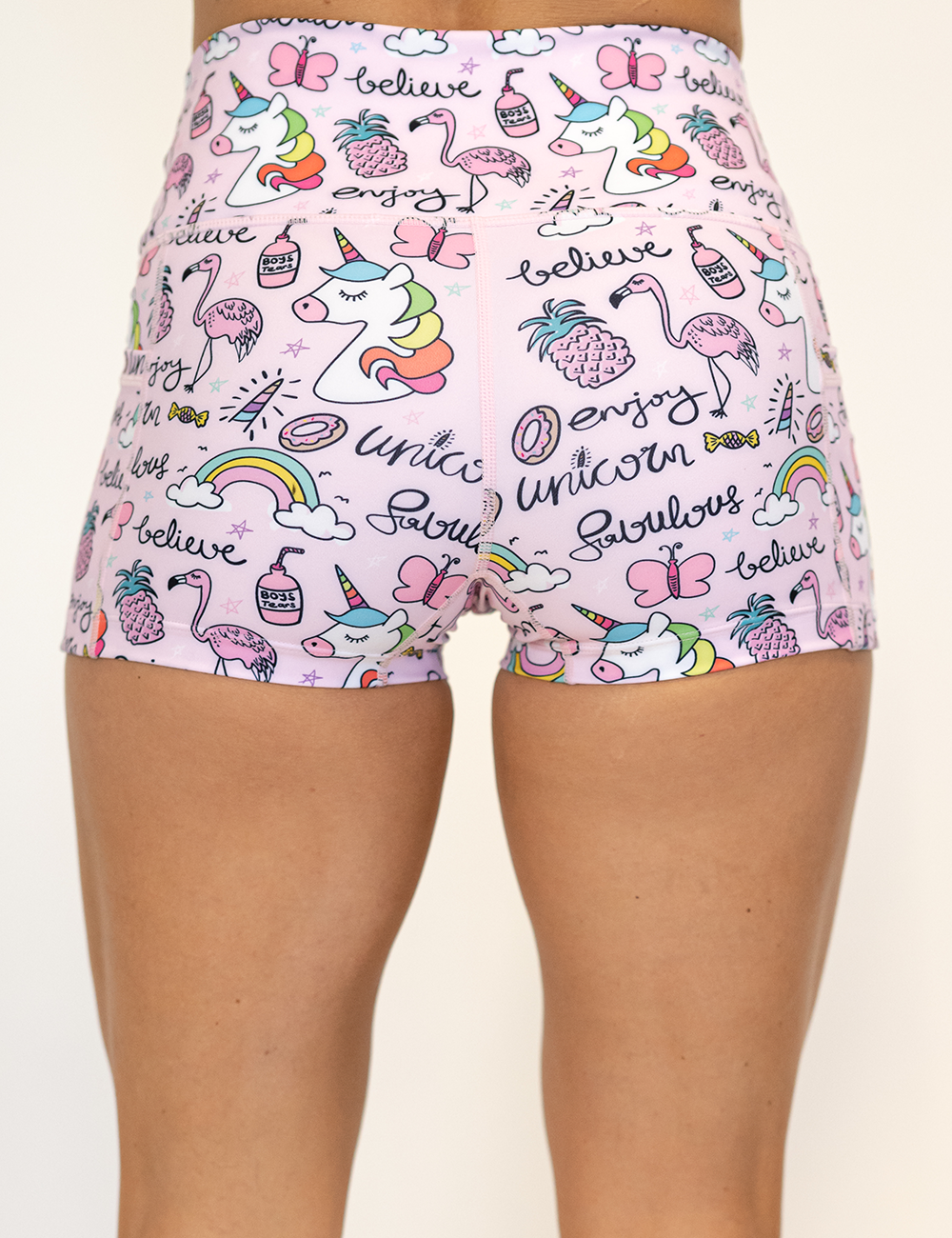 back of the 2.5 inch unicorn and icons pink shorts against a white background
