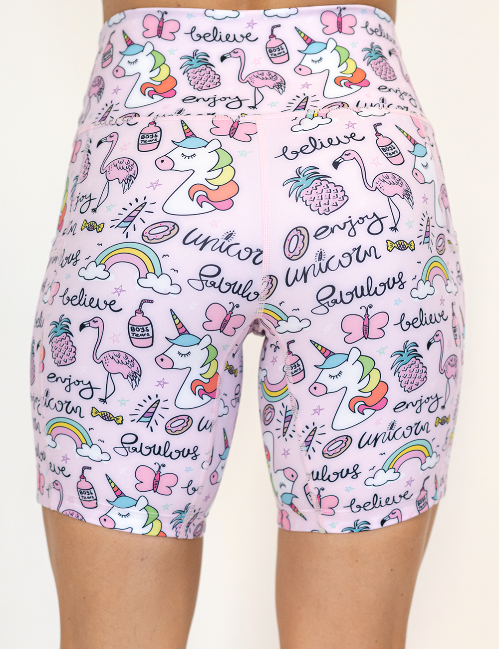 back of the 7 inch unicorn and icons pink shorts against a white background