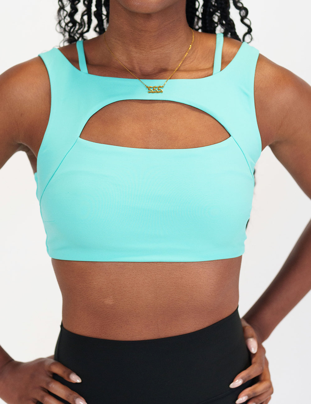 front of the Turquoise sports bra