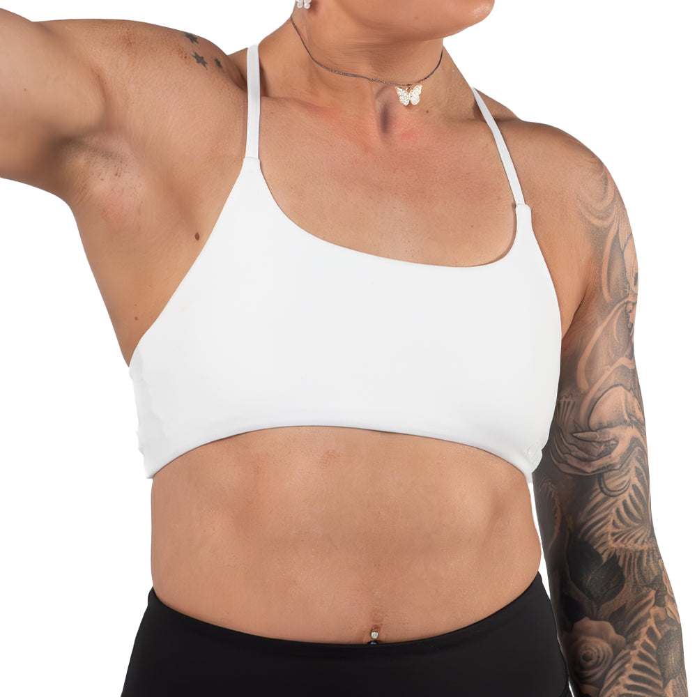 model wearing a solid white sports bra