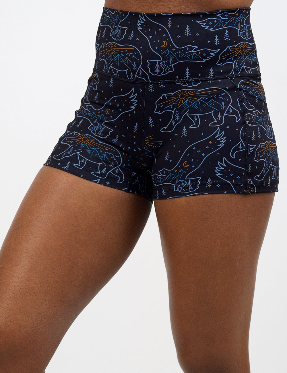 close up of the bird and bear outlines against a dark background 2.5 inch shorts against a white background