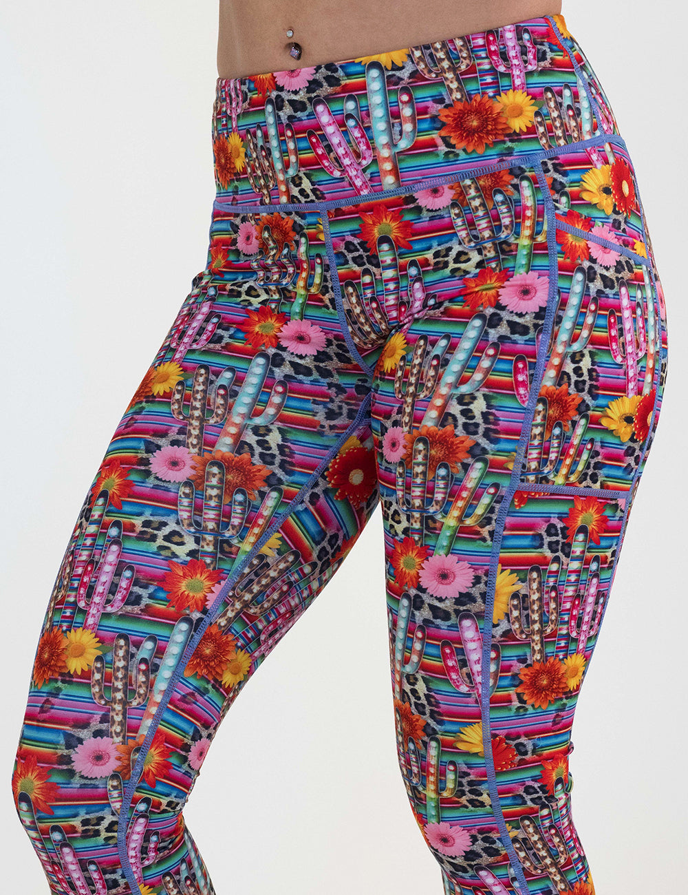 colorful cactus and flower print leggings against a white background
