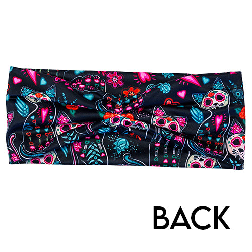 back of the headband with a colorful cat skull and floral design