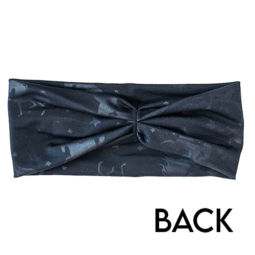 back view of black headband with grey unicorn and stars detail