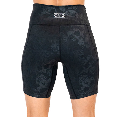 back view of black on black skull print 7 inch shorts
