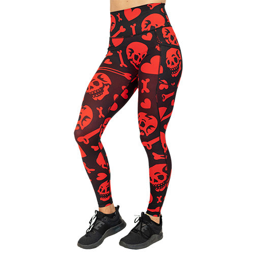 red and black leggings with skulls, bones and hearts
