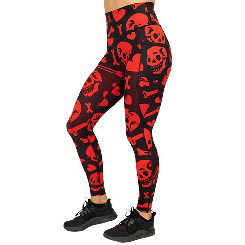 red and black leggings with skulls, bones and hearts