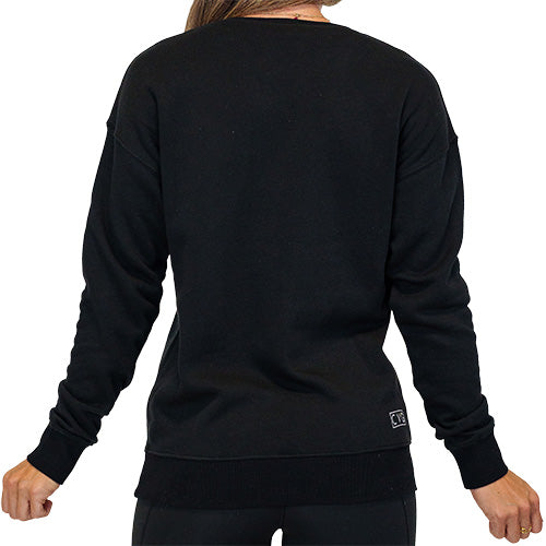 photo of the back of a basic black crewneck