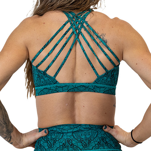 butterfly back strap design on the blue elephant outline sports bra
