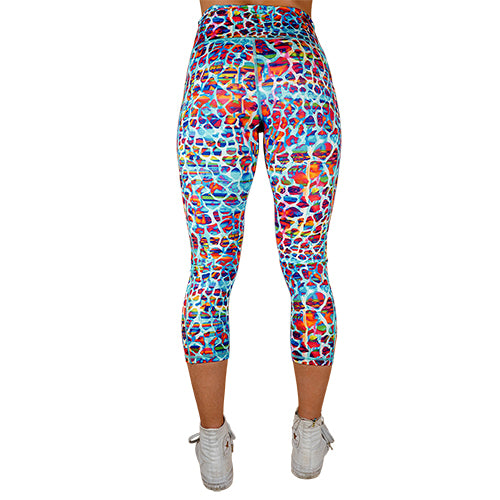back view of capri length colorful giraffe print leggings