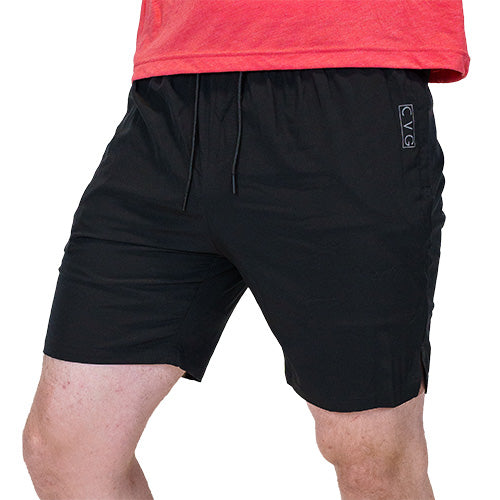 front view of black quarter length unisex shorts