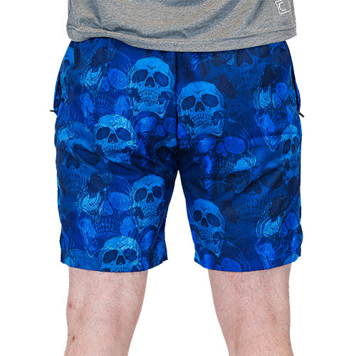 back view of blue skull quarter length unisex shorts